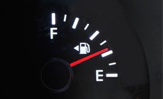 Arrow on gas gauge shows which side the fuel door is on